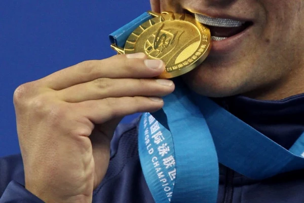 do olympians win money with their medals