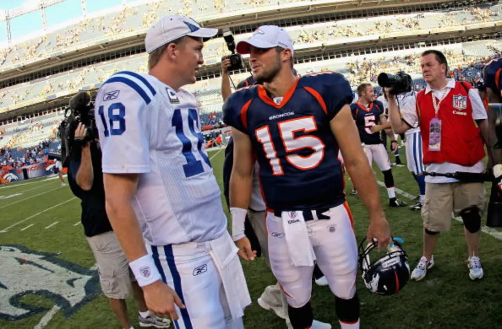 CAPTION THIS: What Is Peyton Manning Saying to Tim Tebow?