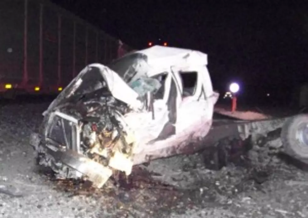 Freight Train Hits Flatbed Pickup