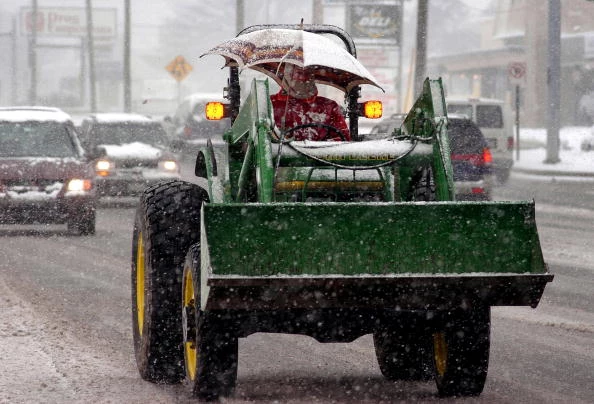 Tractor-in-snow-rain.jpg