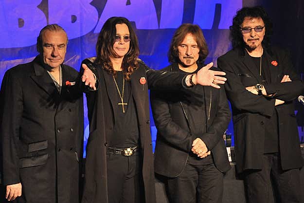  their fingers hoping to hear Ozzy's trademark howl with Tony Iommi's 