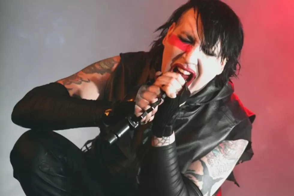 Marilyn Manson Writes Obscenity on Face to Deter Paparazzi at Airport