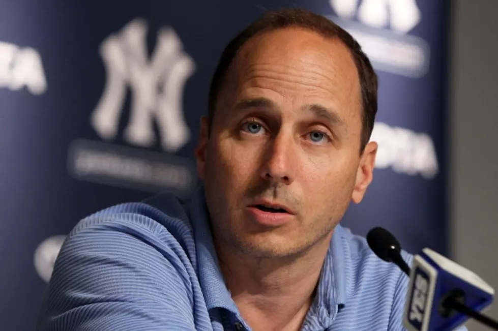 Wife Of Yankees GM Cashman Files For Divorce