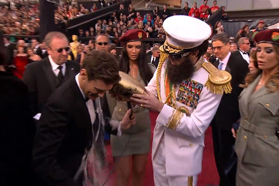 2012 Oscars: Ryan Seacrest Suffers a Wardrobe Malfunction on Red Carpet