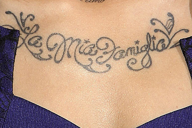 Check out this famous singer's chest tattoo Do you recognize it at all