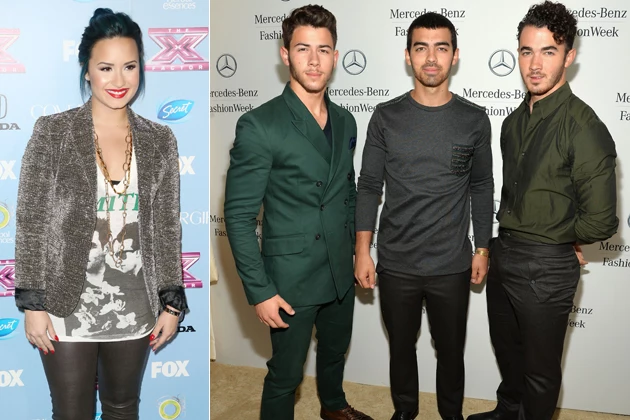 LOS ANGELES, CA - NOVEMBER 04: Singer Demi Lovato attends Fox's 'The X Factor' Finalist Party at the SLS Hotel on November 4, 2013 in Los Angeles, California. (Photo by Frederick M. Brown/Getty Images) / NEW YORK, NY - SEPTEMBER 05: (L-R) Nick Jonas, Joe Jonas, and Kevin Jonas of the Jonas Brothers attend the Mercedes-Benz Star Lounge during Mercedes-Benz Fashion Week Spring 2014 at Lincoln Center on September 5, 2013 in New York City. (Photo by Mike Coppola/Getty Images for Mercedes-Benz)