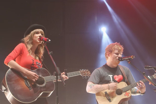 NEW YORK, NY - NOVEMBER 01: Taylor Swift joins Ed Sheeran on stage at his sold-out show at Madison Square Garden Arena on November 1, 2013 in New York City. (Photo by Anna Webber/Getty Images for Atlantic Records)