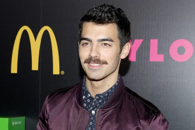 WEST HOLLYWOOD, CA - DECEMBER 05: Joe Jonas attends NYLON + McDonald's Dec/Jan issue launch party, hosted by cover star Demi Lovato on December 5, 2013 in West Hollywood, California.