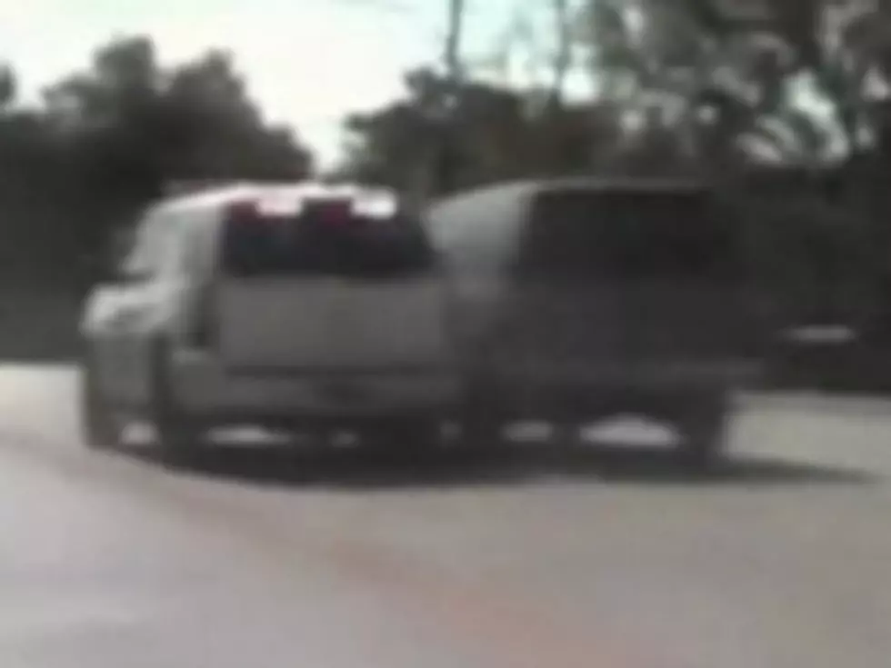 Cop Uses Dangerous Maneuver to Stop Runaway SUV [VIDEO]
