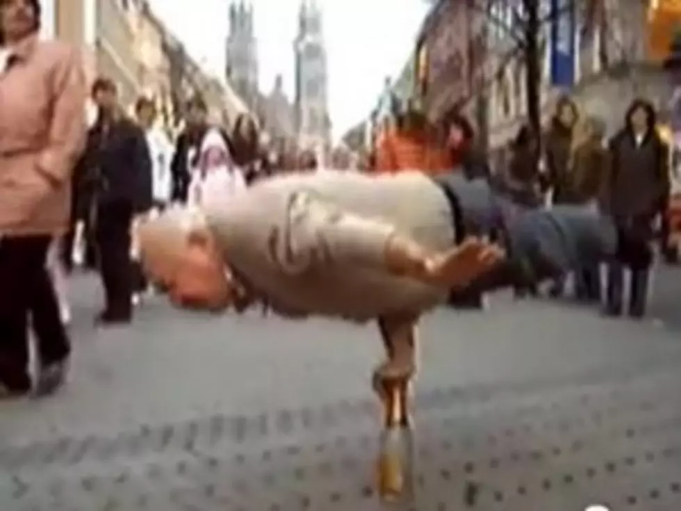 Old Guy Teeters Atop a Bottle and Displays Other Amazing Feats of Balance [VIDEO]