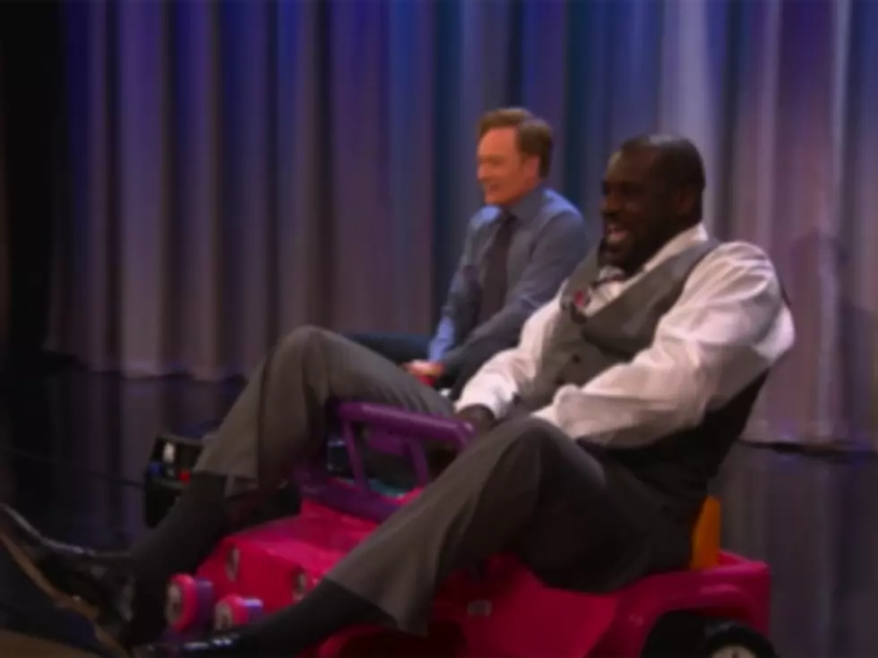 Shaquille O&#8217;Neal Falls Off a Tiny Pink Toy Jeep on &#8216;Conan&#8217; [VIDEO]
