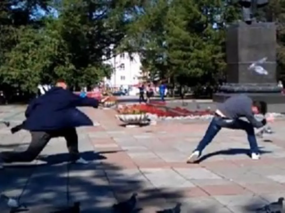 Russians Toss Live Pigeons at Each Other [VIDEO]