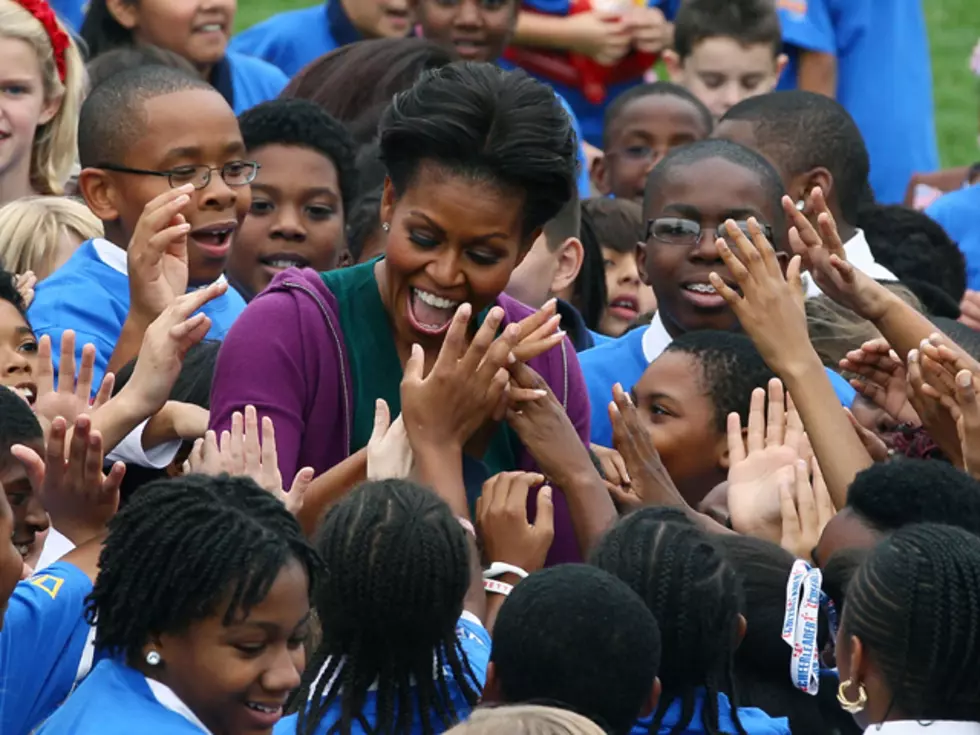 Michelle Obama Sets Jumping Jacks World Record With a Mob of Kids [VIDEO]