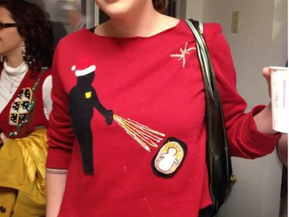 Pepper Spraying Cop Immortalized In Awesome Christmas Sweater [PHOTOS]