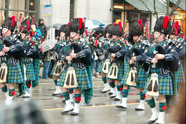 bagpipers marching in a parade