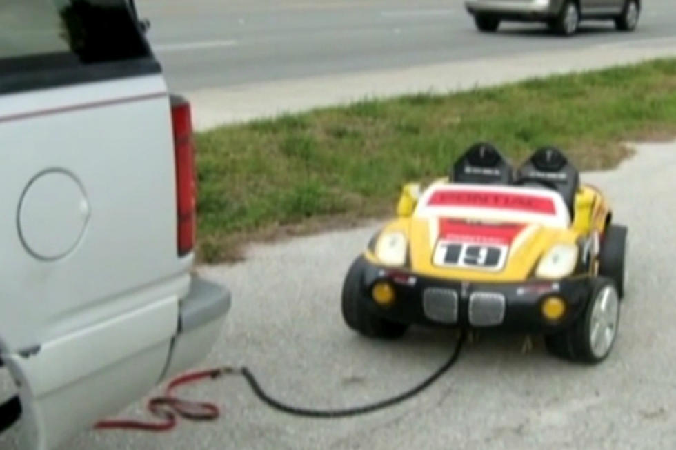 Drunk Grandparents Busted for Towing Child in Toy Car