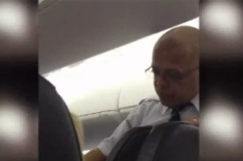 Irate Flight Attendant Rants and Raves at Passengers