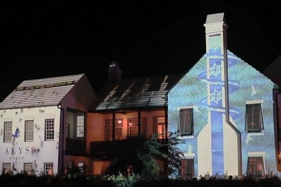 Artist Uses Two Projectors to Turn a House Into a Giant Rube Goldberg Machine
