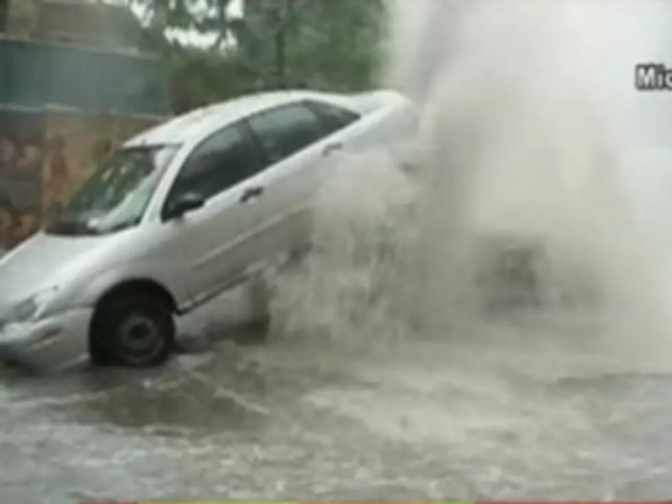 Geyser Erupts From Manhole, Lifts Car Into the Air [VIDEO]