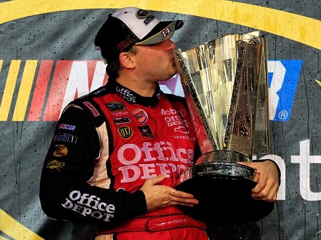 Tony Stewart celebrates his third NASCAR points championship.
