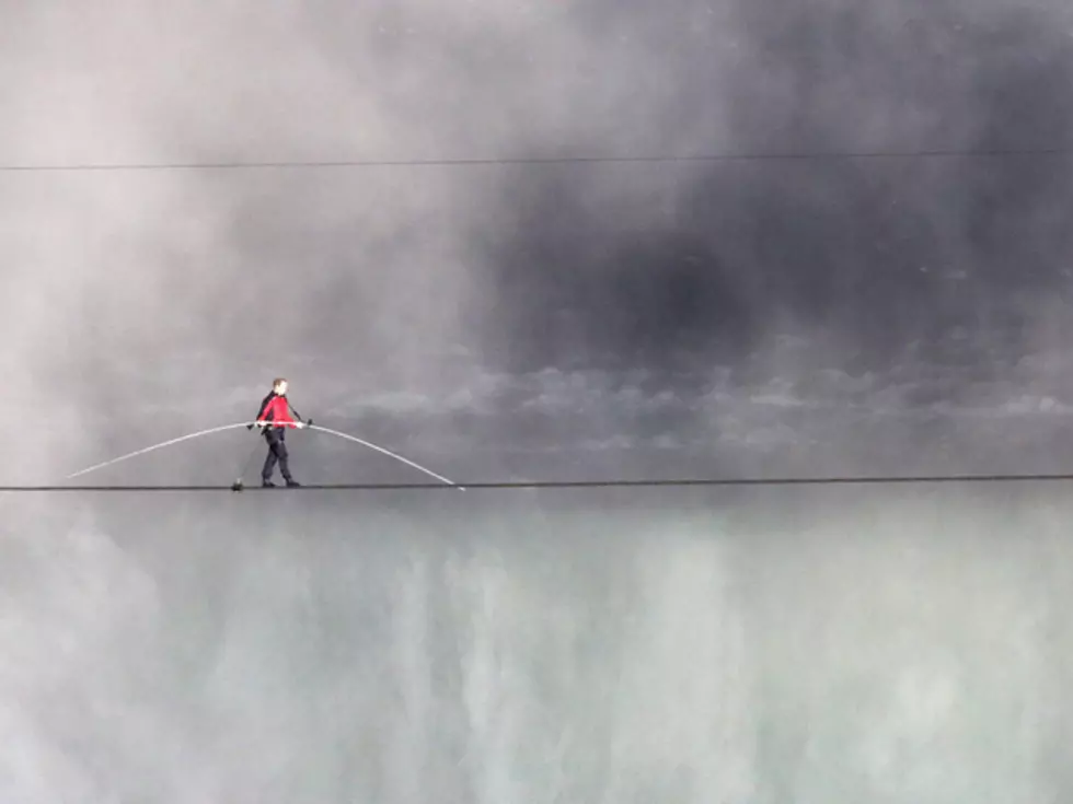 Aerialist Nik Wallenda Becomes First Man to Tight Rope Walk Across Niagra Falls
